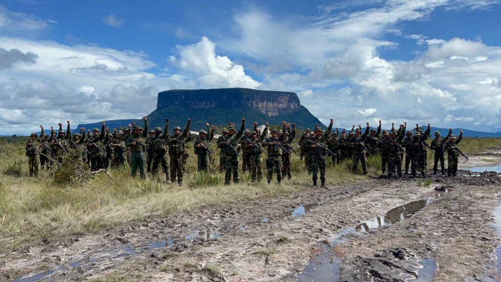 Members of the Bolivarian National Armed Forces salute in front of a protected national park in Venezuela. File photo.