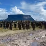 Members of the Bolivarian National Armed Forces salute in front of a protected national park in Venezuela. File photo.