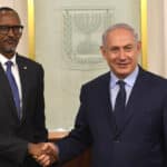 Rwandan President Paul Kagame (left) and Israeli Prime Minister Benjamin Netanyahu (right) shake hands, during the former's visit to Israel in 2017. Photo: Kobi Gideon/GPO.