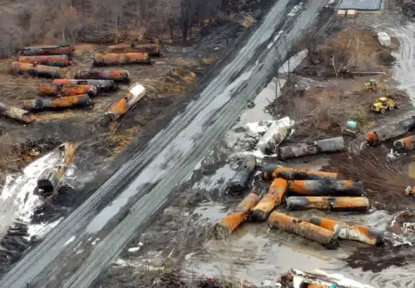 An aerial image from a drone shows the cars of the derailed train and the ongoing clean-up operation in East Palestine, Ohio. Photo: AP/Gene J. Puskar.