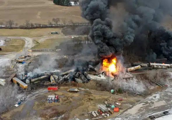 Aerial view of cars of the derailed Norfolk Southern freight train on fire in East Palestine, Ohio, February 4, 2023. Photo: AP/Gene J Puskar.