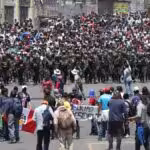 Police forces containing a protest in Peru after the parliamentary coup d'etat against Pedro Castillo. Photo: SADAA Times.