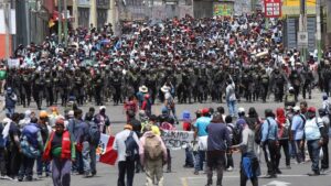 Police forces containing a protest in Peru after the parliamentary coup d'etat against Pedro Castillo. Photo: SADAA Times.