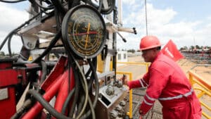 PDVSA Petromonagas worker operating a drilling rig. File Photo.