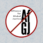 Alliance for Global Justice logo within a circle, with a cross line above it. Photo: Mondoweiss.