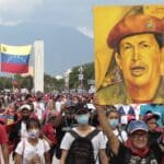Chavistas marching and holding a large drawing of Commander Hugo Chávez at Paseo Los Proceres, Caracas, celebrating the 31st anniversary of the February 4th, 1992, military rebellion. Photo: Peoples Dispatch.