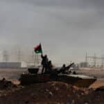 Rebels at the Ras Lanouf oil refining center, March 11, 2011, Libya. Photo: Eric BOUVET/Gamma-Rapho via Getty Images.