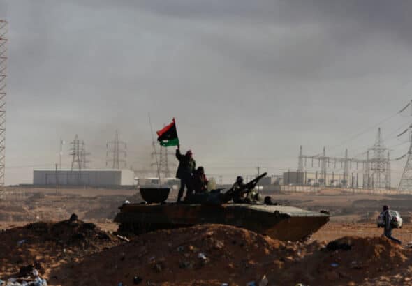 Rebels at the Ras Lanouf oil refining center, March 11, 2011, Libya. Photo: Eric BOUVET/Gamma-Rapho via Getty Images.