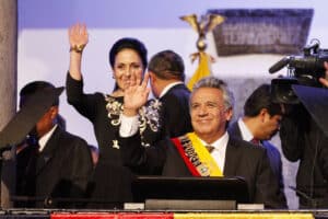 Former Ecuadorian right-wing president Lenin Moreno (right) and his wife Rocío González (left) waving their hands during a ceremony. Photo: File photo.