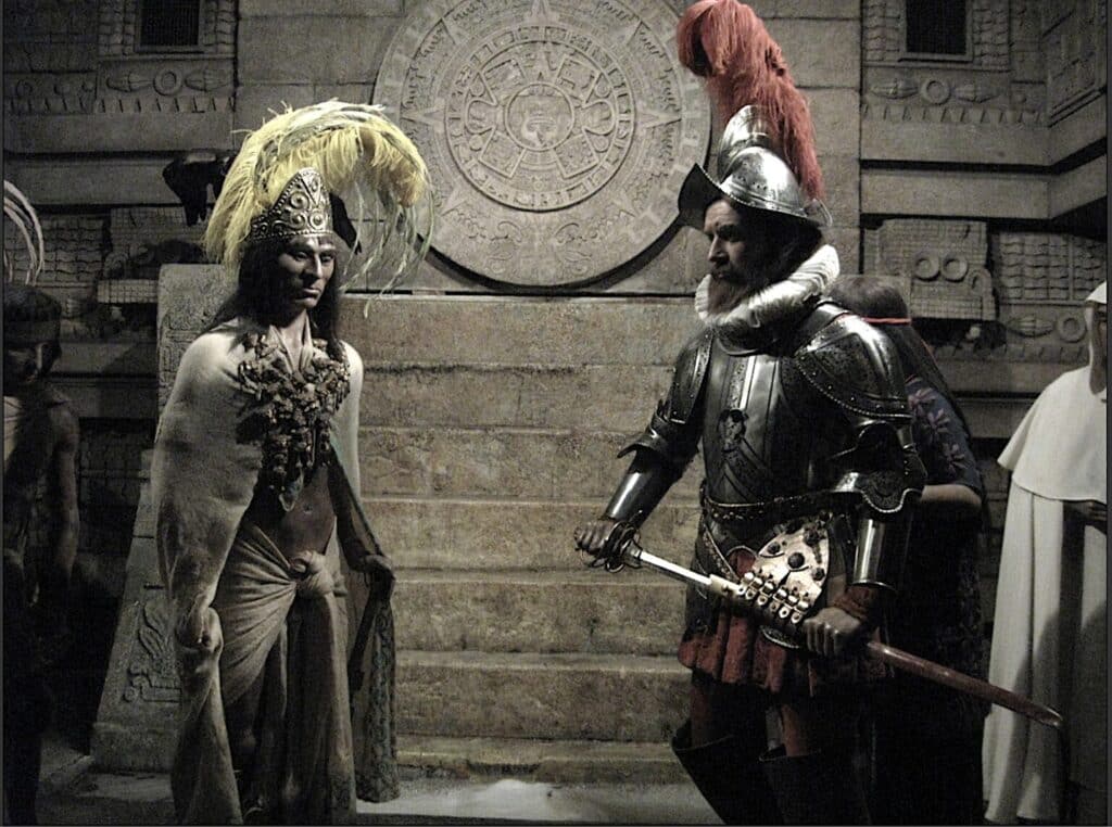 Moctezuma faces Cortés. ("Réplica de Cera de Moctezuma y Hernán Cortes). Photo: Antxoa is licensed under CC BY-NC-SA 2.0.