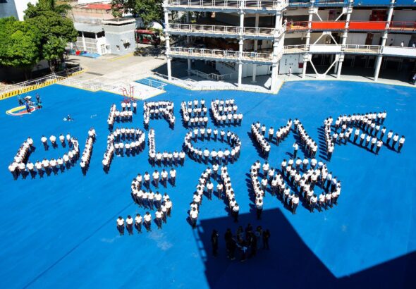 Students of the Police Academy in Caracas do a human banner with the caption: "Free Diplomat Saab." Photo: Twitter/@CrixoVzl.
