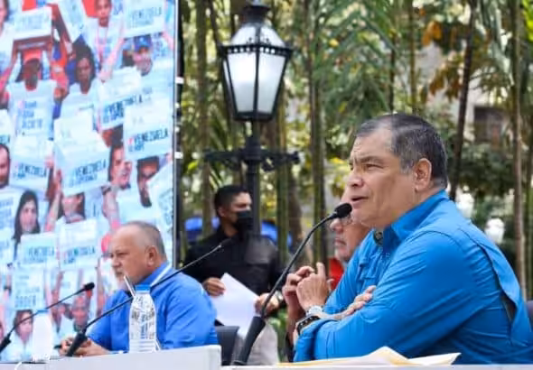 Former Ecuadorian President Rafael Correa (right) speaks at a public event in Caracas, March 9, 2023. Photo: Twitter/@ViceVenezuela.