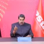 Venezuelan President Nicolás Maduro with Venezuelan and PSUV flags in the background during a virtual conference at the High-Level Dialogue between the Communist Party of China and World Political Parties, this Wednesday, March 15, 2023. Photo: Presidential Press.