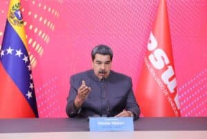 Venezuelan President Nicolás Maduro with Venezuelan and PSUV flags in the background during a virtual conference at the High-Level Dialogue between the Communist Party of China and World Political Parties, this Wednesday, March 15, 2023. Photo: Presidential Press.