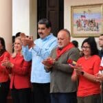 Venezuelan President Nicolás Maduro wearing a blue guayabera (Latin American traditional shirt) and surrounded from left to right by Caracas Mayor Carmen Meléndez, Maduro's wife and deputy Cilia Flores, deputy Diosdado Cabello, Vice President Delcy Rodríguez, and Rosinés Chávez, the youngest daughter of Commander Hugo Chávez. Photo: Presidential Press.