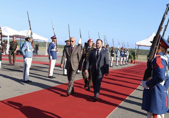 Sahrawi Arab Democratic Republic President Brahim Ghali (left) and Venezuelan Minister for Foreign Affairs Yván Gil (right) walking down the red carpet through a military file organized to receive the African leader this Sunday, March 19, 2023. Photo: Twitter/@CancilleriaVE.