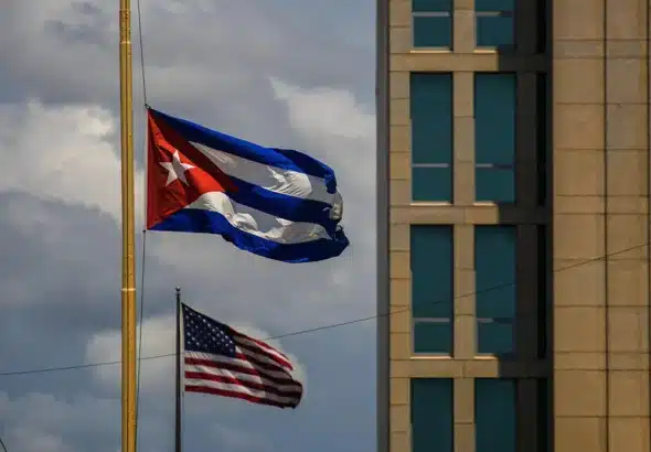 Cuba and US Flags outside the US embassy in Havana. Cuba, May 17, 2022. Photo: AP Photo/Ramon Espinosa.
