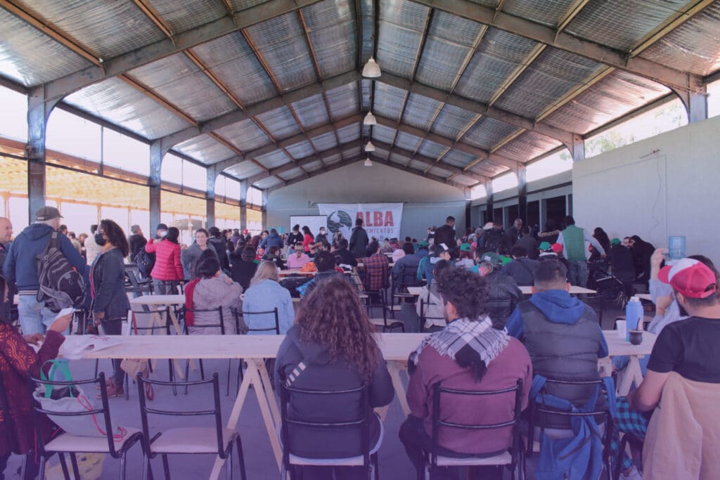 Attendees listening to a presentation during the third Continental Assembly of ALBA Movements, April 2022. Photo: CapireMov.