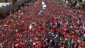 Chávez's coffin being transferred to the Cuartel de la Montaña amid crowds that filled the main avenues of Caracas on March 15, 2013. File photo.