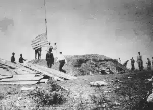 US Marines raising the American Flag over Guantanamo Bay in 1898 US Marine Corps. Photo: The LIFE Images Collection/Getty.
