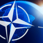 NATO logo with an earth globe in the background. Photo: File photo.