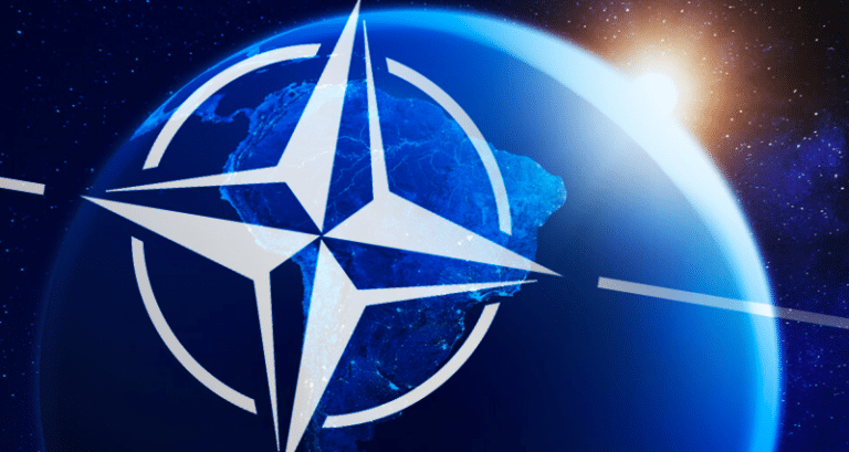 NATO logo with an earth globe in the background. Photo: File photo.