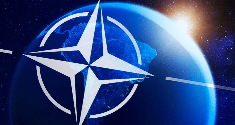 NATO logo with an earth globe in the background. Photo: File photo.