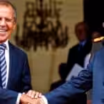 Russian Foreign Minister Sergey Lavrov (left) and Venezuelan President Hugo Chavez (right) bold due to his cancer treatment and laughing in front of cameras during Lavrov's visit to Caracas in 2011. Photo: Reuters/File photo.