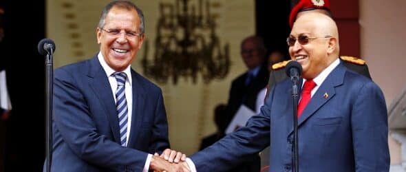 Russian Foreign Minister Sergey Lavrov (left) and Venezuelan President Hugo Chavez (right) bold due to his cancer treatment and laughing in front of cameras during Lavrov's visit to Caracas in 2011. Photo: Reuters/File photo.
