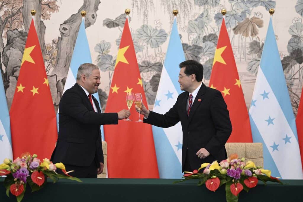 Featured image: Honduras Foreign Minister Eduardo Enrique Reina García (left) and new Chinese Foreign Minister Qin Gang raise a toast following the establishment of diplomatic relations between the two countries, at a ceremony in the Diaoyutai State Guesthouse in Beijing, Sunday, March 26, 2023. Photo: Greg Baker/Pool Photo via AP.