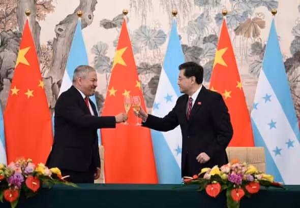 Featured image: Honduras Foreign Minister Eduardo Enrique Reina García (left) and new Chinese Foreign Minister Qin Gang raise a toast following the establishment of diplomatic relations between the two countries, at a ceremony in the Diaoyutai State Guesthouse in Beijing, Sunday, March 26, 2023. Photo: Greg Baker/Pool Photo via AP.