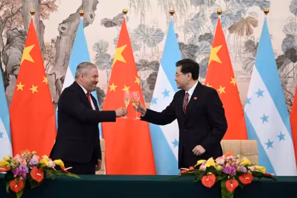 Featured image: Honduras Foreign Minister Eduardo Enrique Reina García (left) and new Chinese Foreign Minister Qin Gang raise a toast following the establishment of diplomatic relations between the two countries, at a ceremony in the Diaoyutai State Guesthouse in Beijing, Sunday, March 26, 2023. Photo: Greg Baker/Pool Photo via AP.