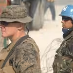 A US Marine and a UN soldier in Haiti during a 2010 deployment. Photo: File photo.