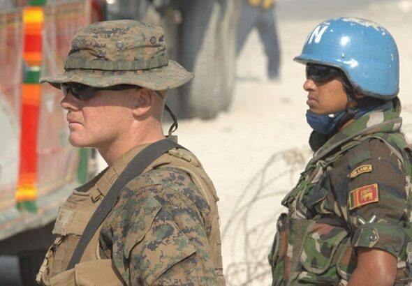 A US Marine and a UN soldier in Haiti during a 2010 deployment. Photo: File photo.
