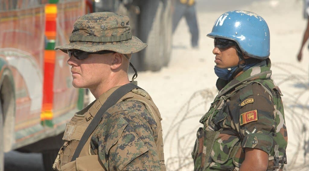 A US Marine and a UN soldier in Haiti during a 2010 deployment. Photo: File photo.