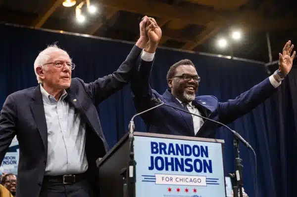 Bernie Sanders (left) and Chicago’s mayoral candidate Brandon Johnson (right)  at Credit Union 1 Arena on March 30, 2023. Photo: Colin Boyle/Block Club Chicago.