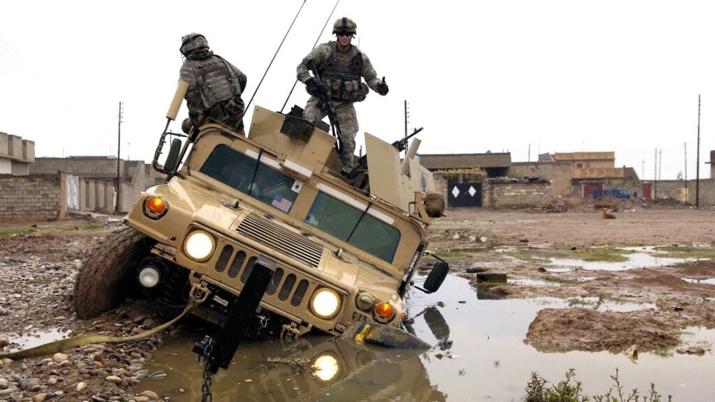 US military vehicles stuck. Photo: Getty Images.