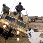 US military vehicles stuck. Photo: Getty Images.