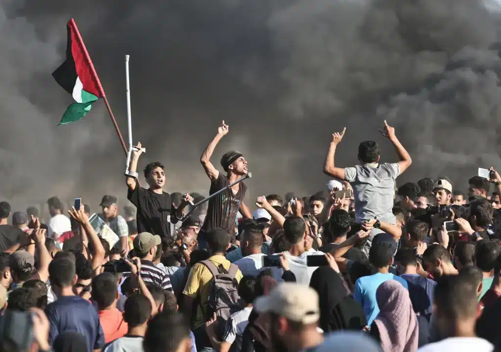 Palestinians at the Gaza-Israel border during the Great March of Return, March 2018. Photo: Al Jazeera.