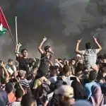 Palestinians at the Gaza-Israel border during the Great March of Return, March 2018. Photo: Al Jazeera.