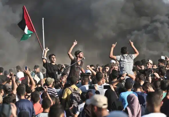 Palestinians at the Gaza-Israel border during the Great March of Return, March 2018. Photo: Al Jazeera.