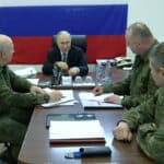 Russian President Vladimir Putin meets with commanders of Russian troops in Kherson region of Russia. Photo: Sputnik International.