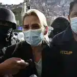 Former de facto ruler of Bolivia Jeanine Áñez being taken to court to charge her for the Senkata massacre. Photo: RedRadioVE.