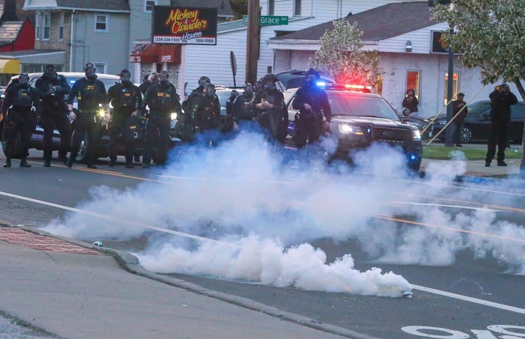 Akron police deploy chemicals to disperse peaceful protesters after the decision to not indict the police that killed Jayland Walker. Photo: Fighting Words.