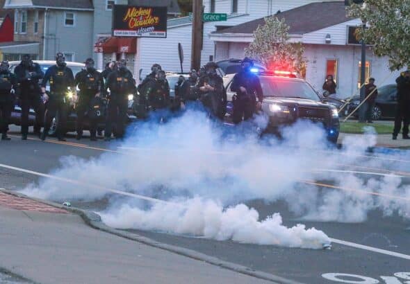 Akron police deploy chemicals to disperse peaceful protesters after the decision to not indict the police that killed Jayland Walker. Photo: Fighting Words.