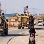 A convoy of US armored vehicles patrolling the occupied territories of northeastern Syria bordering Turkey. Photo: File photo.