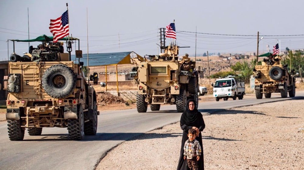 A convoy of US armored vehicles patrolling the occupied territories of northeastern Syria bordering Turkey. Photo: File photo.