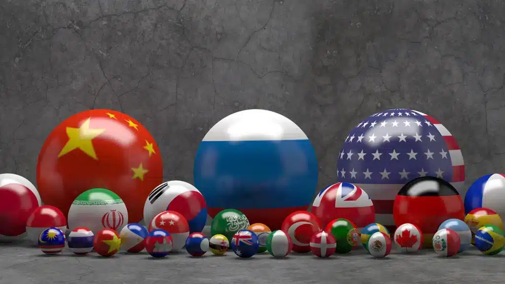 Photo composition showing pool balls with flags of different countries. China, Russia and the US are the biggest balls while Japan, India, South Korea, UK, Germany and France follow in size along 21 smaller flags. Photo: Russian International Affairs Council.