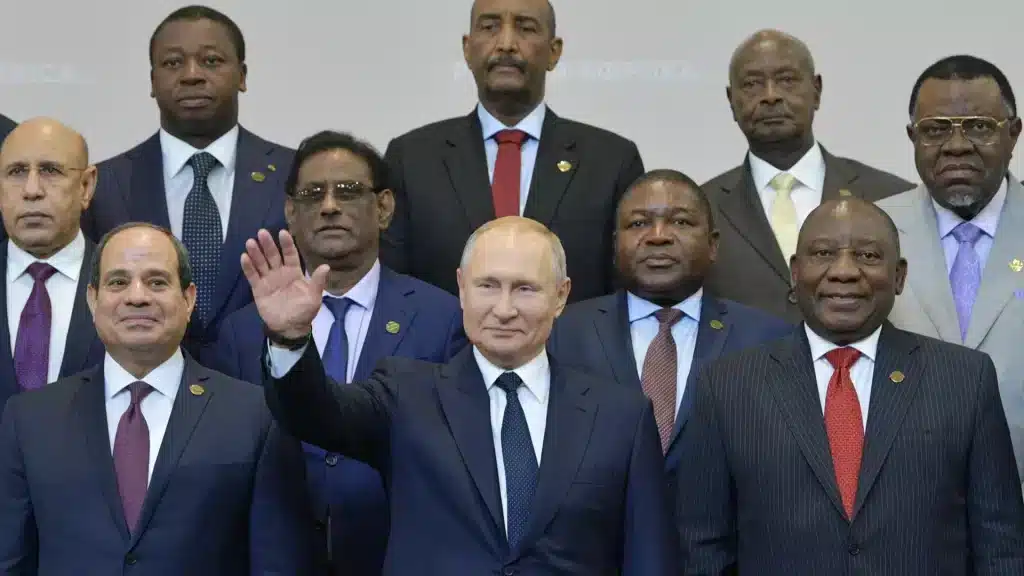 Russian President Vladimir Putin (center) gestures as Egyptian President Abdel Fattah al-Sisi (left) and South African President Cyril Ramaphosa (right) pose for a photo with African country leaders attending the 2019 Russia-Africa Summit and Economic Forum in Sochi, Russia, on Oct. 24, 2019. Photo: Alexei Druzhinin/Sputnik/AFP/Getty Images.