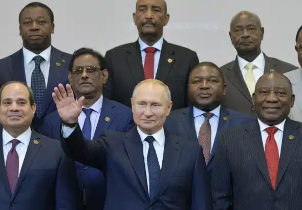 Russian President Vladimir Putin (center) gestures as Egyptian President Abdel Fattah al-Sisi (left) and South African President Cyril Ramaphosa (right) pose for a photo with African country leaders attending the 2019 Russia-Africa Summit and Economic Forum in Sochi, Russia, on Oct. 24, 2019. Photo: Alexei Druzhinin/Sputnik/AFP/Getty Images.